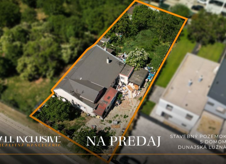 Aerial view of a plot with a house in Dunajská Lužná intended for living.