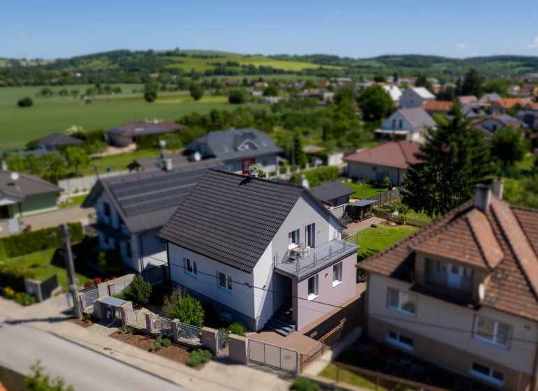 A family house on Jahodová Street in Trenčín with a terrace and a landscaped garden.