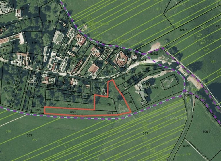 A flight plan in Belá-Dulice marking residential plots with parcel numbers.