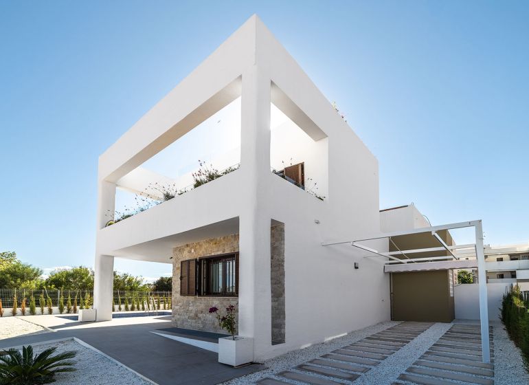 Two-story 2-bedroom apartment in Pulpí with minimalist design and a garden.