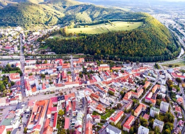 Aerial view of Banská Bystrica with a beautiful panorama and searching for a 3-room apartment.