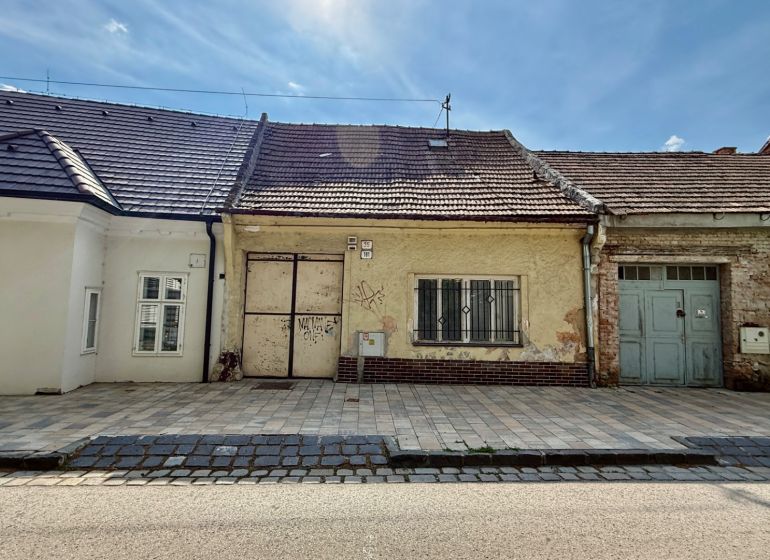 A family house on Pekárska Street in Trnava with a traditional facade and an older roof.