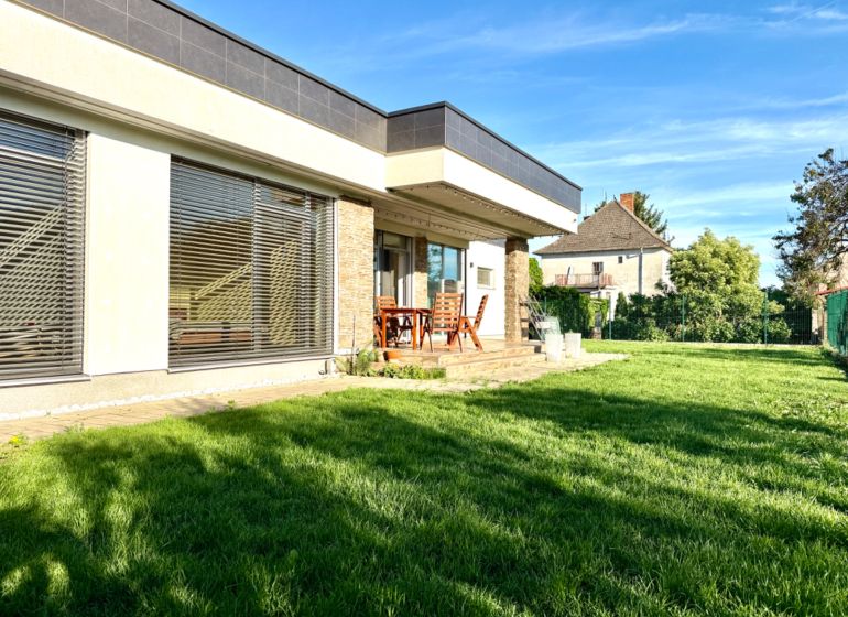 A family house on Lipová Street in Pata with a garden and seating on the terrace.