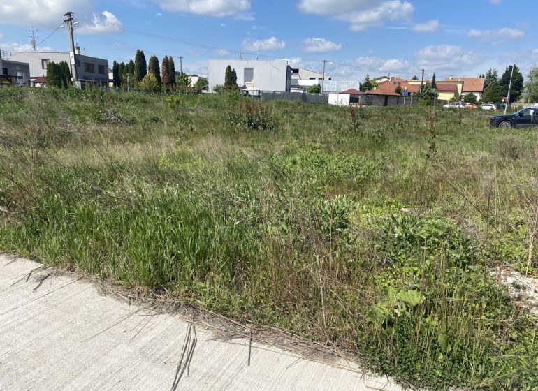 Plots - housing in Veľký Lég, Lehnice, with a view of greenery and a solid road.