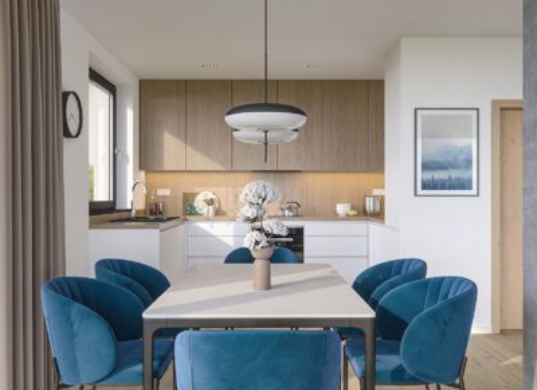 A dining room of a family house with a wooden decor floor and blue chairs.