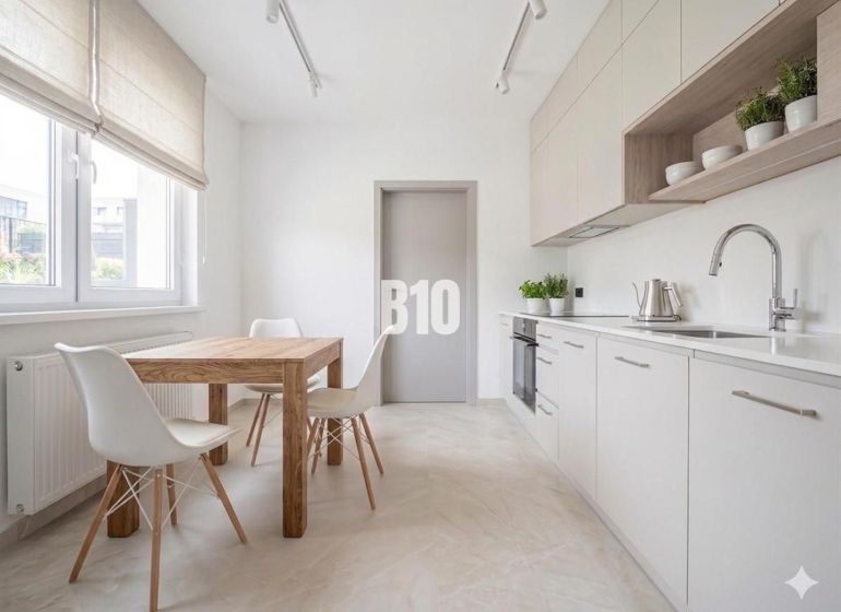 A kitchen in a 3-room apartment with a wooden decor floor and a wooden table.