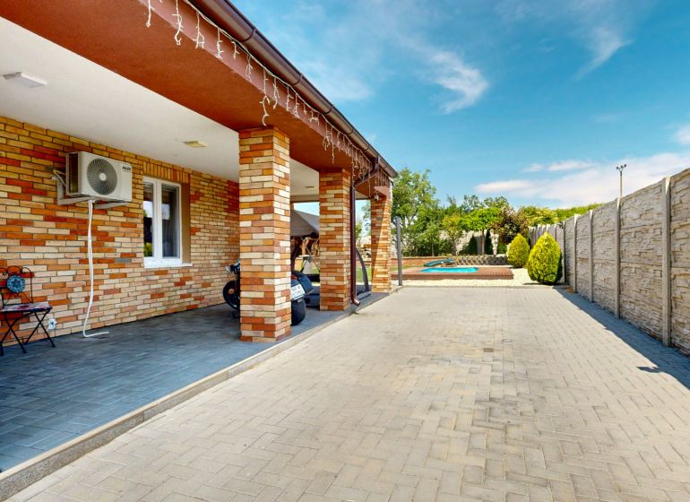 Family house in Lehota on Lehota Street, terrace with adjacent garden and swimming pool.