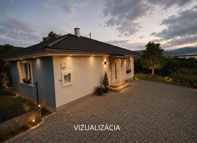A family house in Ružiná with a landscaped garden and a view of the surrounding nature.