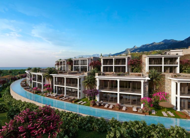 A holiday apartment in Agia Eirini with a sea view, surrounded by greenery and palm trees.
