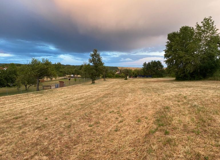 Agricultural and forest land in Krupina with a beautiful view of the surrounding nature and sky.