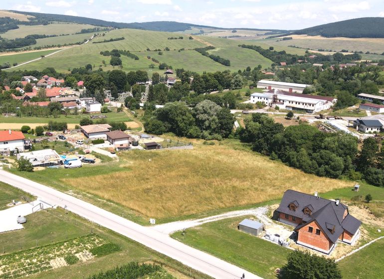 Land - housing on Laski Street in Vrbovce, with a view of the rural character of the landscape.