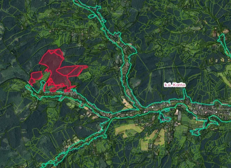 Map of agricultural and forest lands in the village of Korňa with highlighted area boundaries.
