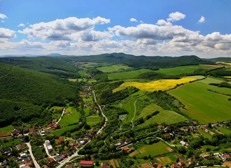 The landscape around the village of Prašník with fields and hilly terrain for Special properties.