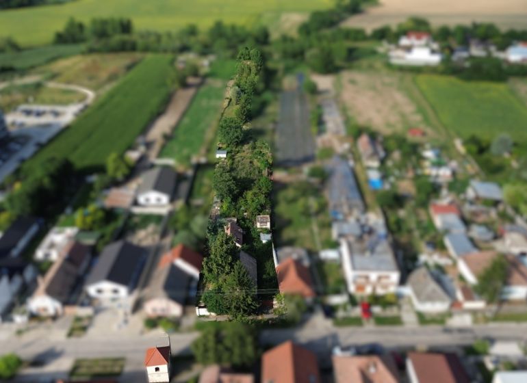 Aerial view of gardens and houses in the area of Plots - housing in Banská Bystrica.