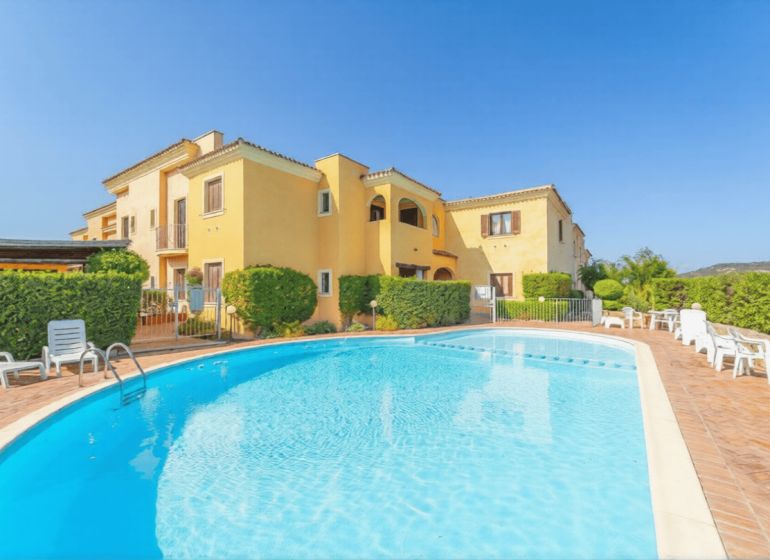 A holiday apartment in Sardinia offering a pool and spacious outdoor areas.