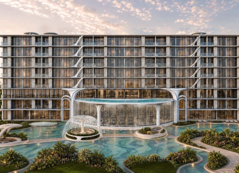 Recreational apartment in Pattaya with a water fountain and modern architecture in a tropical setting.