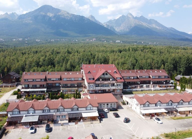 A view of snow-covered mountains and the surrounding nature around Poprad.