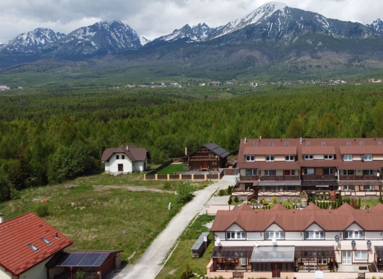 A view of snow-covered mountains and the surrounding nature around Poprad.