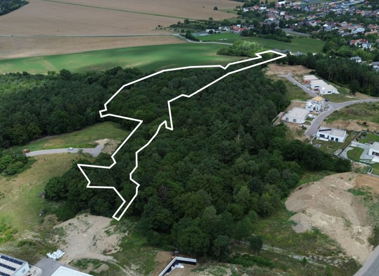 Aerial view of agricultural and forest lands in Nova Dubnica on Jablonova Street.