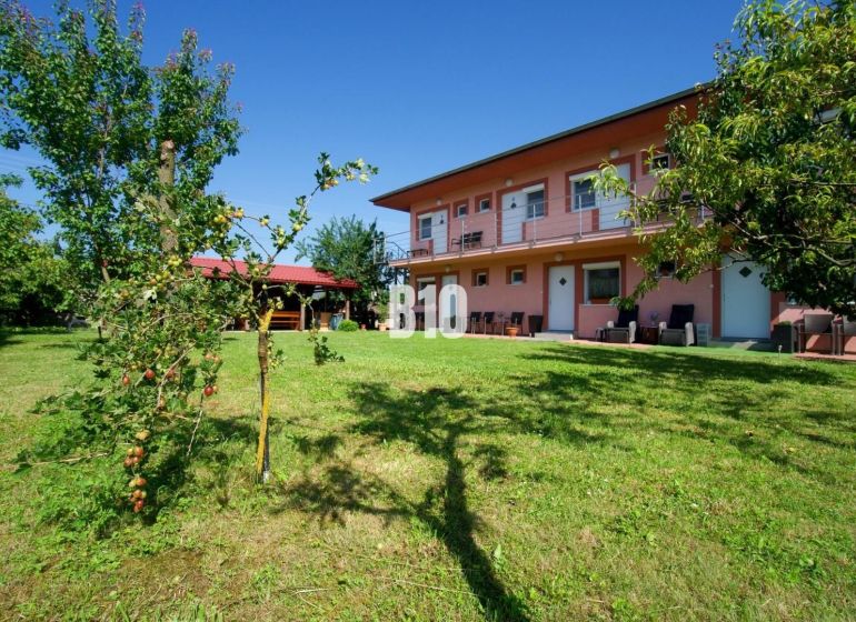 A family house in Podhájska with a large garden and a gazebo for relaxation.