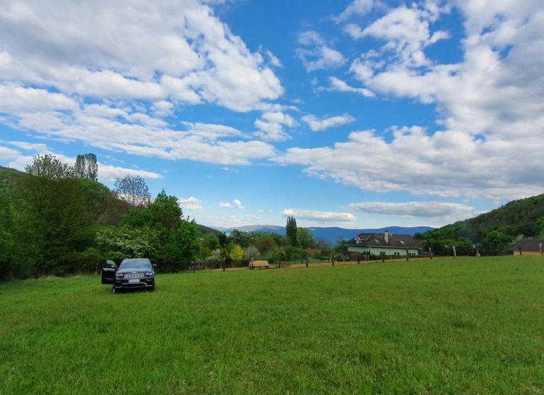 A plot for residential use in Nitrianske Sučany surrounded by nature and open countryside.