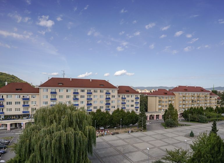 A view of Sad kpt. Nálepku in Nová Dubnica with apartment buildings in the background.
