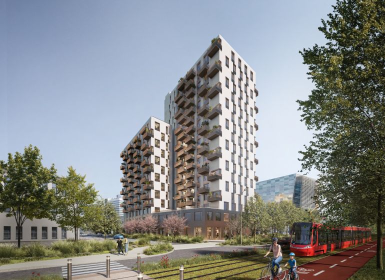 New building with balconies, cyclist and tram on Mlynské Nivy in Bratislava-Ružinov.