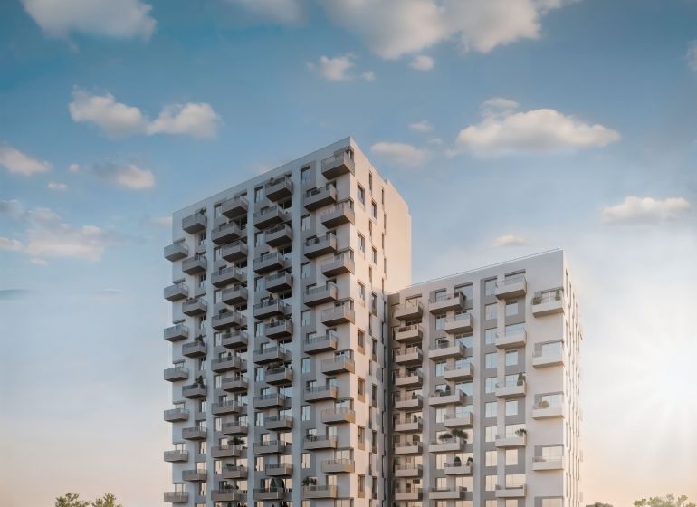 A high-rise building on Mlynské Nivy in Bratislava - Ružinov with balconies and greenery.