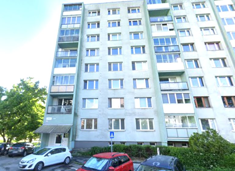Apartment building on Ostravská Street in Košice, Juh district, with a parking lot.