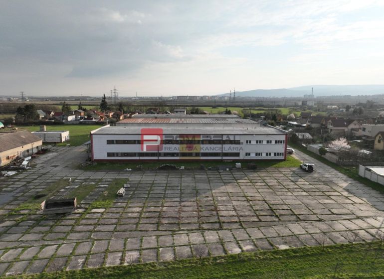 Production premises on Pezinská Street in Vinosady, large paved area.