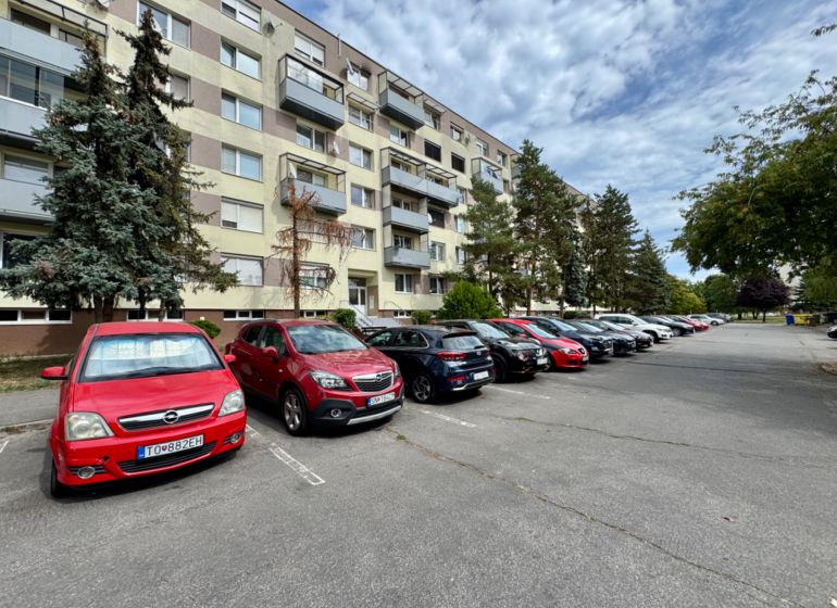Parking lot at the apartment building in Topoľčany for residents of one-bedroom apartments.