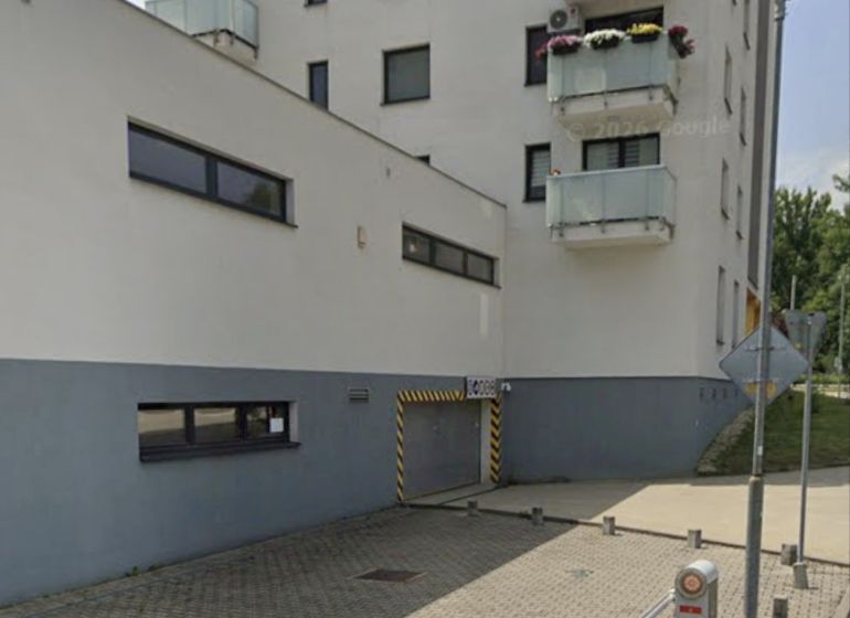 Entrance to the garages on Švermova Street in Banská Bystrica, near the residential building.