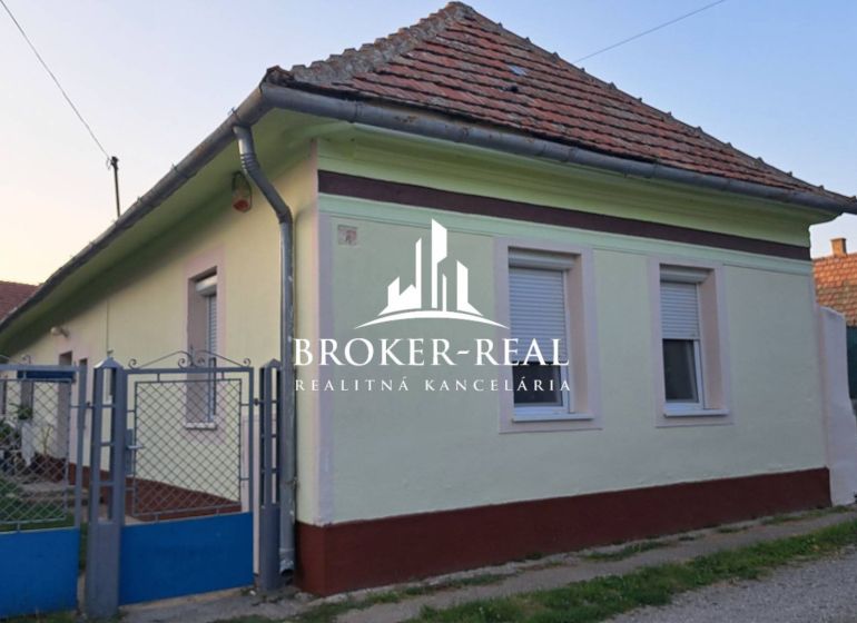 A family house in Gönc with a classic pitched roof and colorful facade.