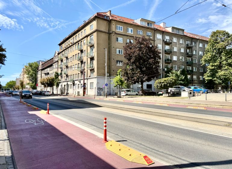 View of Vajanského nábrežie street in Bratislava - Old Town with buildings and a cycle path.