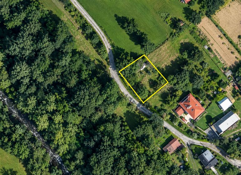 Aerial view of residential plots in Radôstka by the forest road.