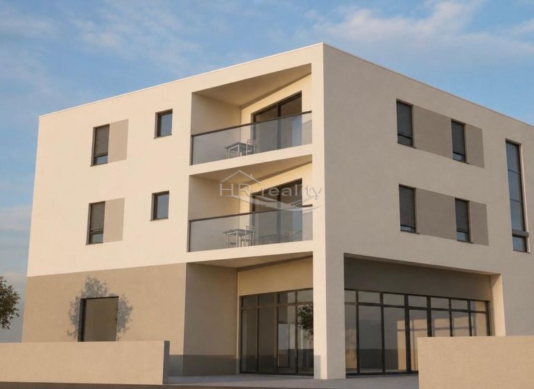 The exterior of a holiday apartment in the town of Vodice with a modern facade and balconies.
