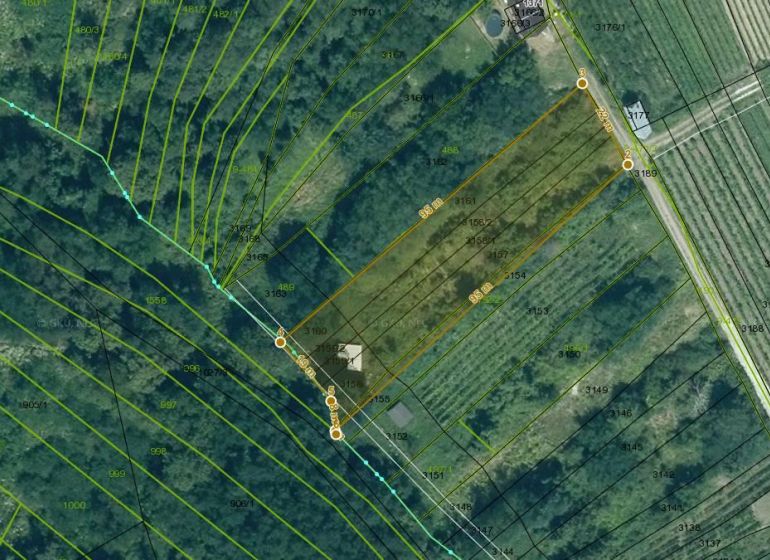Aerial view of recreational plots in Veľký Krtíš with a marked parcel.