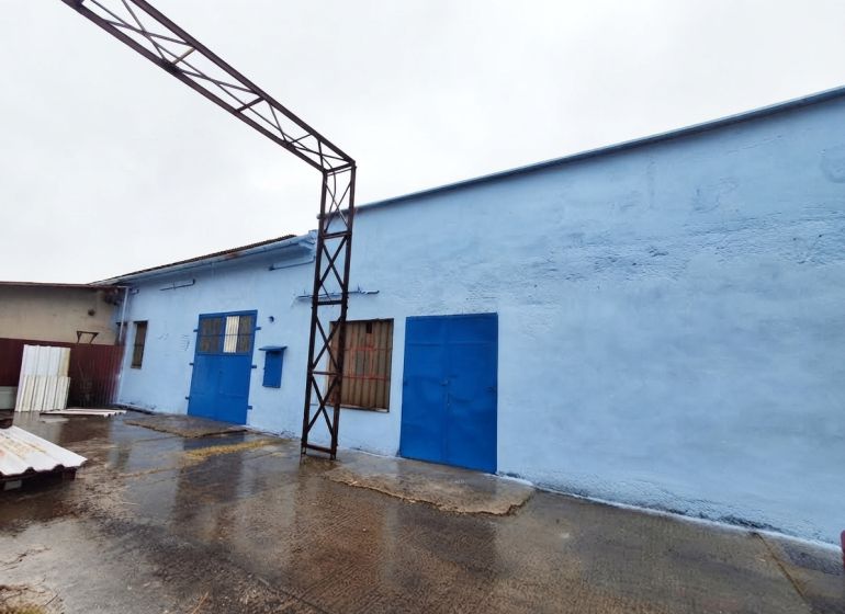 Blue building on Niklová Street in Sereď in the Warehouses and Halls section.
