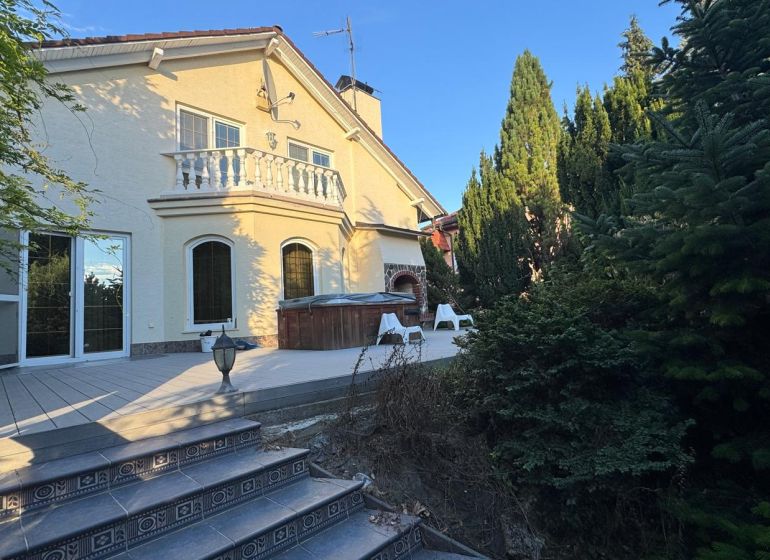 A family house in Trenčianske Stankovce with a garden, terrace, and outdoor seating.