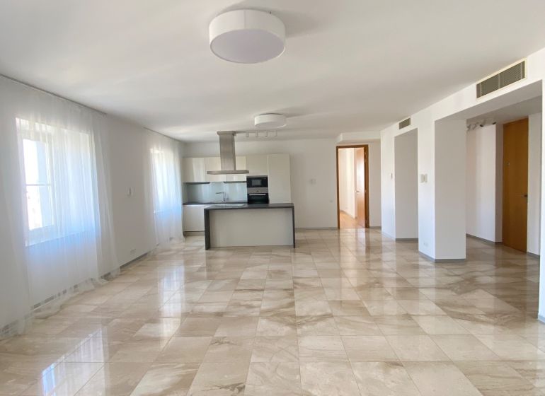 A bright space of a 3-room apartment on Hlboká Street with tiles and a modern kitchen.