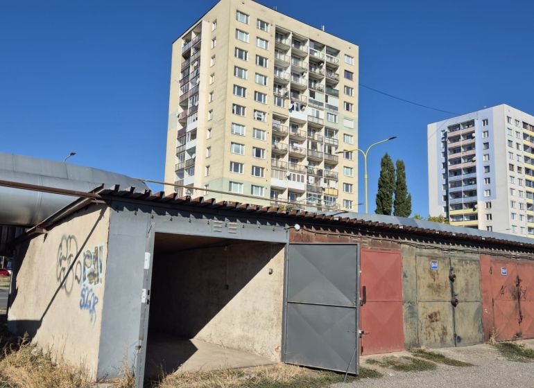 Garages on Jantárová Street in Košice, Juh district, in front of the apartment buildings.