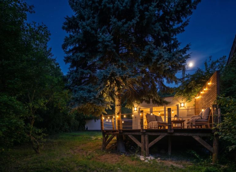 Evening lighting on the terrace among the trees, Recreational plots, Bratislava - Devín, Devínska cesta.