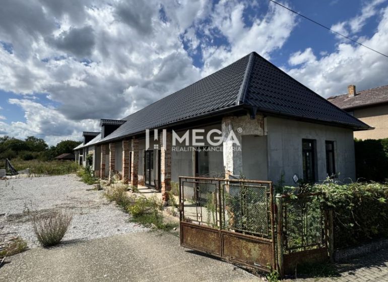 A family house in Nacina Ves with a modern roof and an open extensive plot.