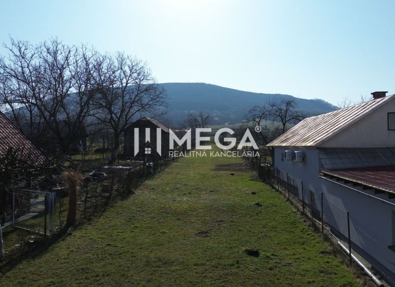 A view from Ptičie to Ptičie - residential plots with a view of the hills.