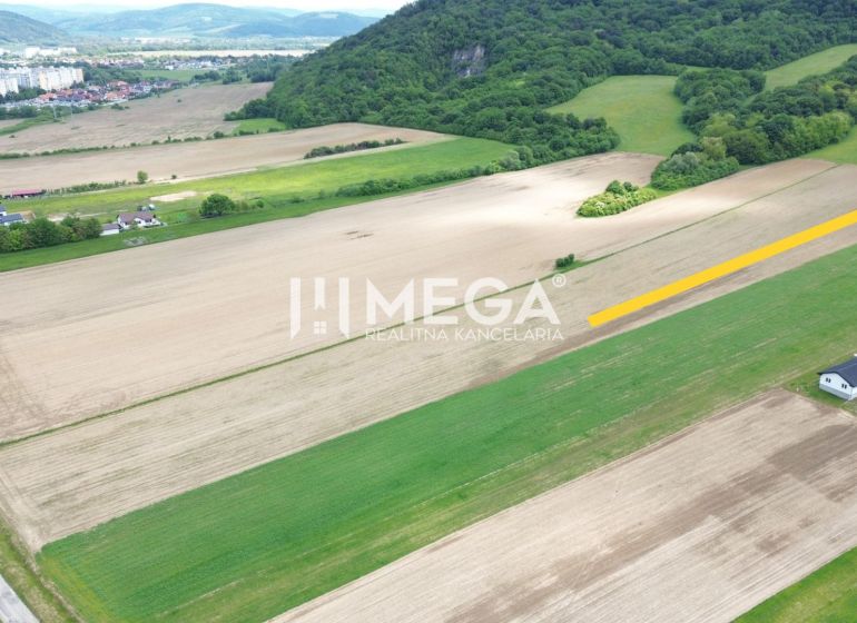 Aerial view of agricultural and forest land near Dlhá Street in Jasenov.