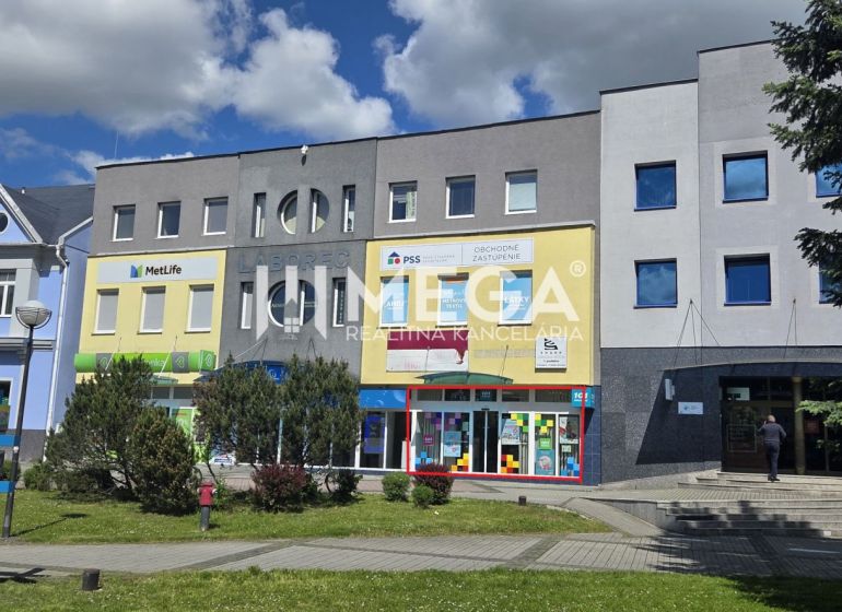 Commercial spaces on Freedom Square in Humenné, modern facades and display windows.