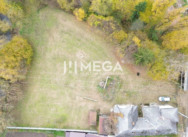 Aerial view of a residential plot on Československej armády Street in Stakčín surrounded by greenery.