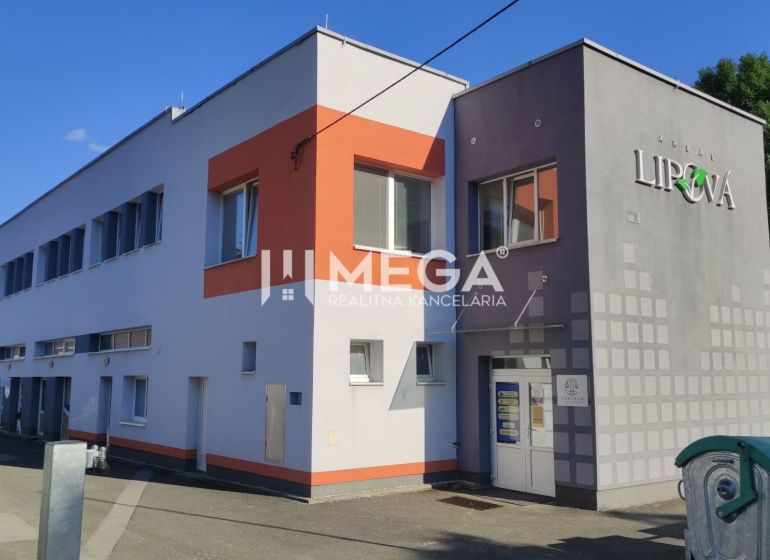 Office building on Lipová Street in Humenné with a clean facade and parking.
