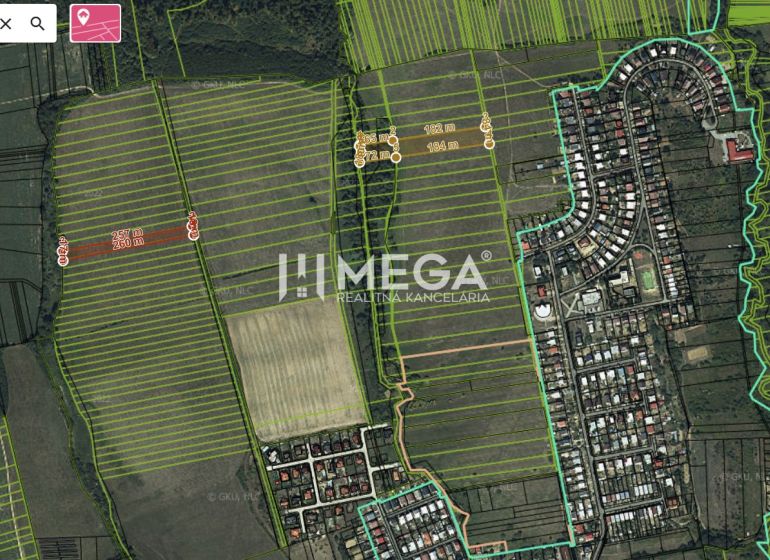 Aerial view of agricultural and forest land in the Humenné area.