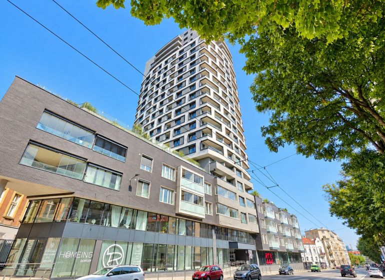 The building on Šancová Street in Bratislava – Staré Mesto, with modern architecture and greenery.